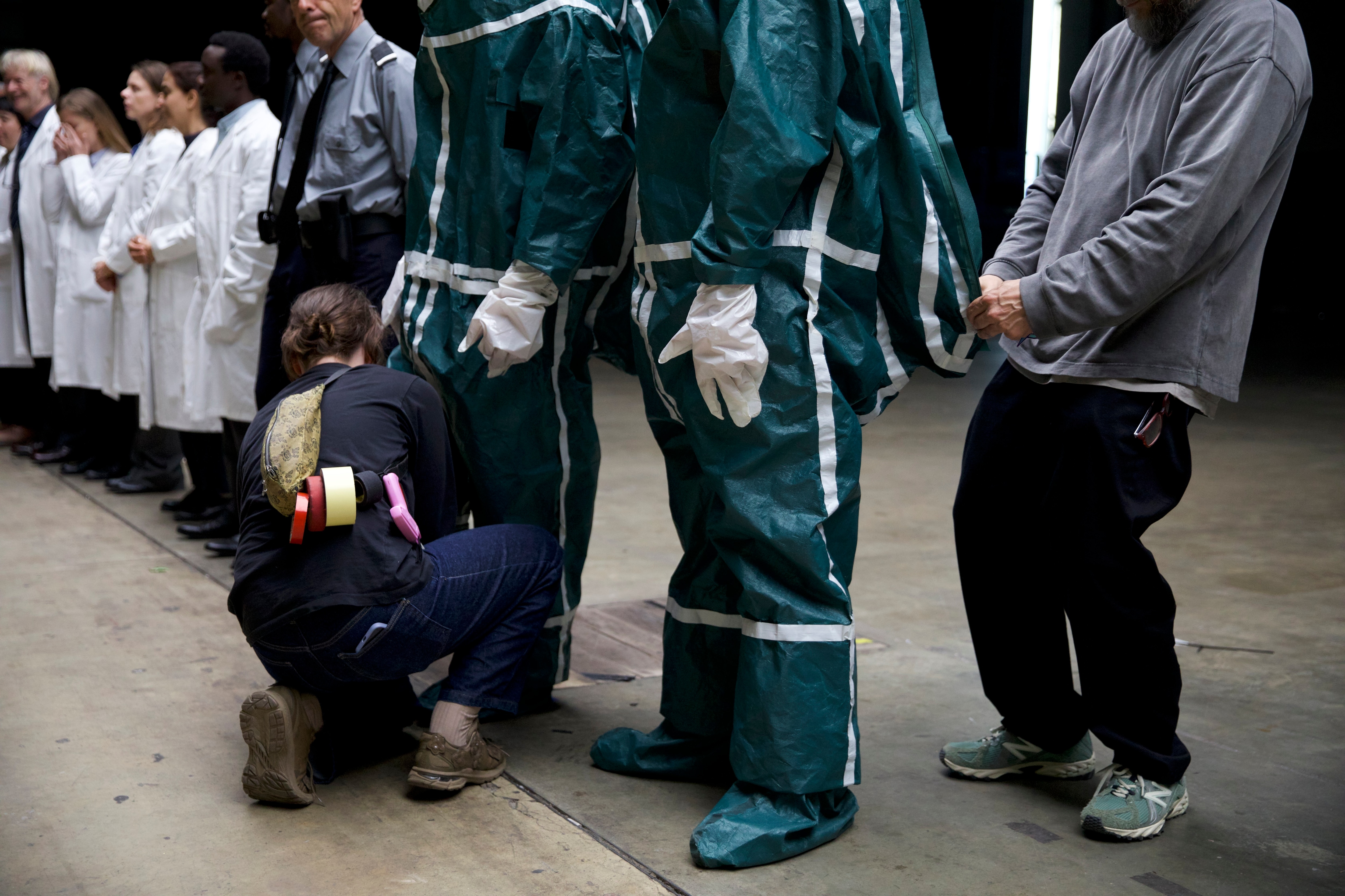 Ensuring the costumes for extras look right, despite not ultimately making the cut